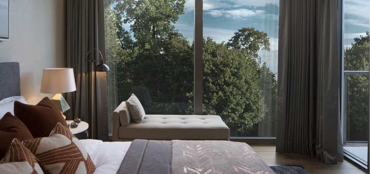 Guest bedroom in the upmarket apartment development Lansdowne Place overlooking Lansdowne Road and screened by mature oak trees