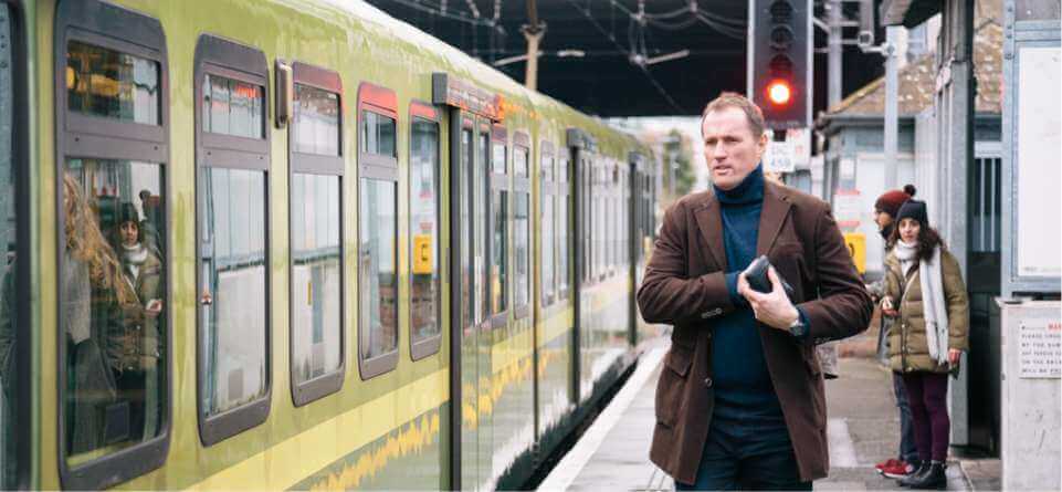 Local commuters at the DART station at Lansdowne Road in Dublin 4 beside Lansdowne Place Apartments