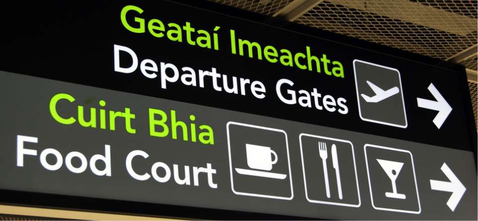 Signage at Dublin Airport directing people to Departure Gates and Food Court